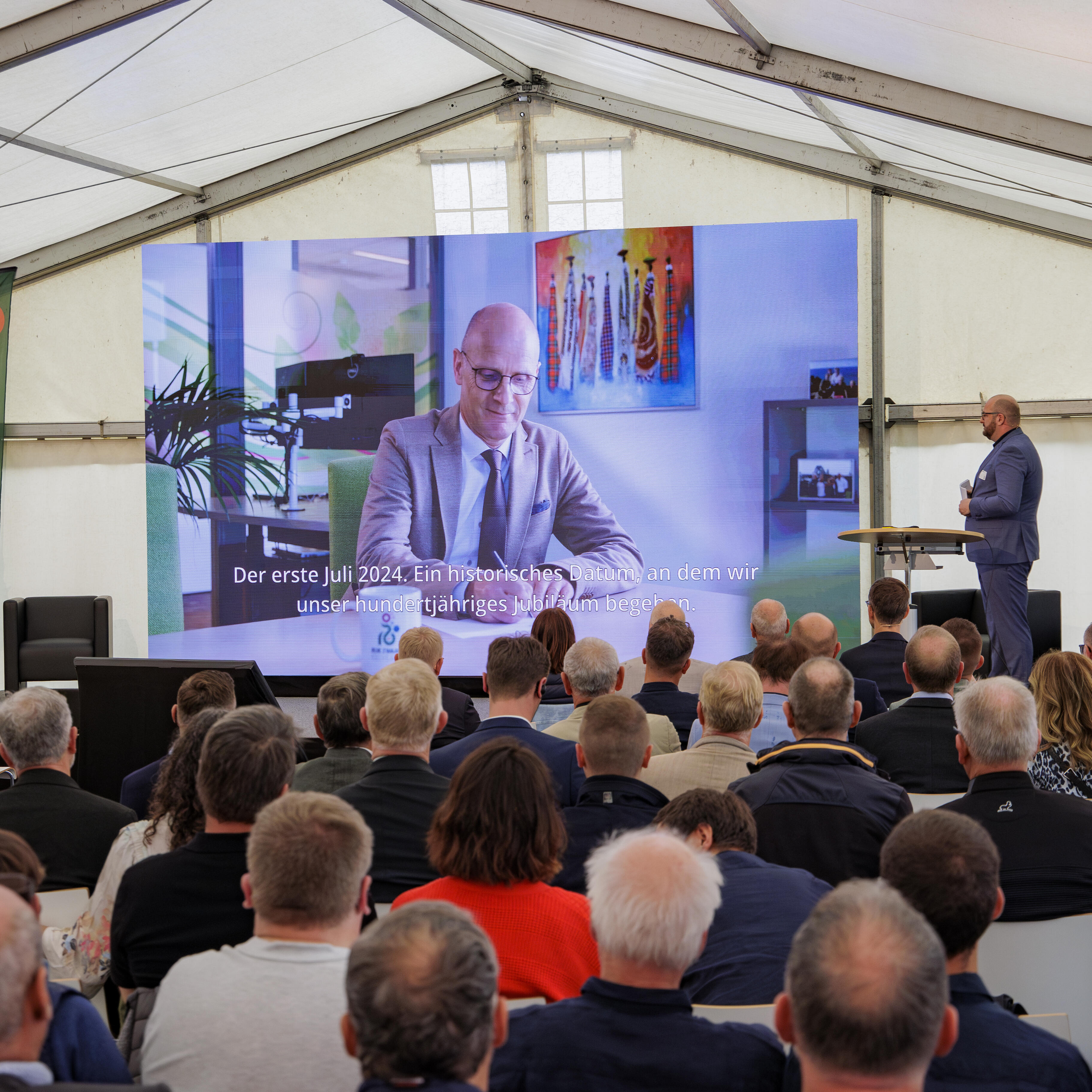 Guests in the marquee follow the panel discussion at Rijk Zwaan's 100th anniversary celebration